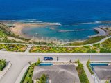 Girne Esentepe'de Muhteşem Manzaralı Denize Sıfır 2+1 Bahçeli Daire