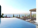 Girne Esentepe'de Muhteşem Manzaralı Denize Sıfır 2+1 Bahçeli Daire