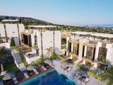 Girne Edremit’te Eşsiz Deniz ve Dağ Manzaralı Lüks 1+1 Bahçeli Daire!