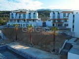 Girne Edremit’te Eşsiz Deniz ve Dağ Manzaralı Lüks 1+1 Bahçeli Daire!