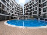 Girne Merkezde satılık balkonu Deniz gören Eşyalı 2+1 daire