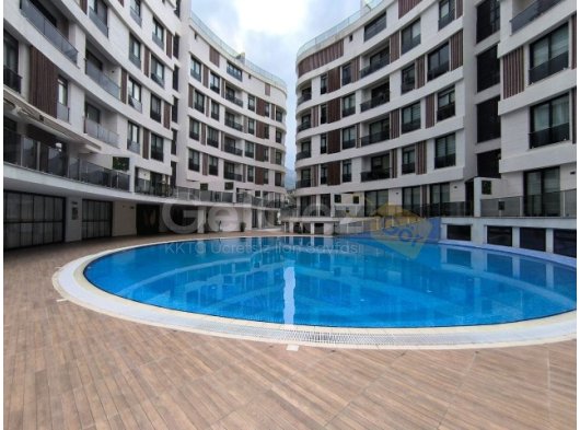 Girne Merkezde satılık balkonu Deniz gören Eşyalı 2+1 daire