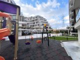 Girne Merkezde satılık balkonu Deniz gören Eşyalı 2+1 daire