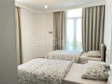 Girne Merkezde satılık balkonu Deniz gören Eşyalı 2+1 daire