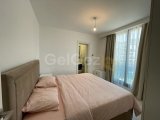 Girne Merkezde satılık balkonu Deniz gören Eşyalı 2+1 daire