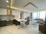 Girne Merkezde satılık balkonu Deniz gören Eşyalı 2+1 daire
