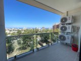 Girne Merkezde satılık balkonu Deniz gören Eşyalı 2+1 daire