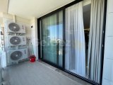 Girne Merkezde satılık balkonu Deniz gören Eşyalı 2+1 daire