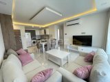 Girne Merkezde satılık balkonu Deniz gören Eşyalı 2+1 daire