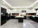 satılık 3+1villa girne alsancak bölgesi güneş enerjisi sistemi kış bahçeli 25 çeşit meyve ağacı geniş açık plan modern mutfak