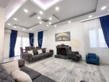 satılık 3+1villa girne alsancak bölgesi güneş enerjisi sistemi kış bahçeli 25 çeşit meyve ağacı geniş açık plan modern mutfak