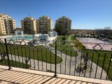 satılık 2+1 daire iskele merkezinde ortak havuzlu ve tenis kortu.şehir merkezine, denize ve ünimar markete yürüme mesafesinde