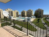 satılık 2+1 daire iskele merkezinde ortak havuzlu ve tenis kortu.şehir merkezine, denize ve ünimar markete yürüme mesafesinde