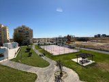 satılık 2+1 daire iskele merkezinde ortak havuzlu ve tenis kortu.şehir merkezine, denize ve ünimar markete yürüme mesafesinde