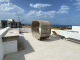 Girne,Esentepe, Bahcheli bölgesinde satılık 1+1 penthouse daire