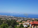 Bellapais’te Önü Kapanmaz Muhteşem Manzaralı satılık 2 800 m2 arsa + 450 m2 villa