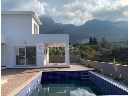 Çatalköy’de satılık 3+1 havuzlu villa , Kapanmaz Deniz manzaralı