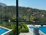 Girne , Belapais'de ortak yüzme havuzlu satılık 2+1 lüks daire