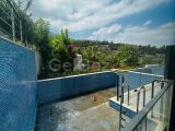 Girne Bellapais'te satılık havuzlu 4+1 lüks dubleks daire