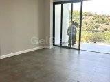 Girne , Belapais'de ortak yüzme havuzlu satılık 2+1 lüks daire
