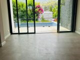 Girne Bellapais'te satılık havuzlu 4+1 lüks dubleks daire