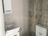 Girne merkezde deniz ve dağ manzaralı satılık 1+1 daire