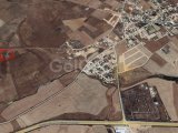 GAZİMAĞUSA/MUTLUYAKA'DA SATILIK 8 DÖNÜM 1 EVLEK TARLA
