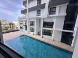 GİRNE OSCAR OTEL BÖLGESİNDE HAVUZLU LÜKS SİTEDE SATILIK 2+1 DAİRE
