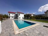GİRNE/ALSANCAK'TA MERİT HOTELLERE YAKIN KONUMDA SATILIK 6+2 ÖZEL HAVUZLU VİLLA