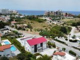 GİRNE/ALSANCAK'TA MERİT HOTELLERE YAKIN KONUMDA SATILIK 6+2 ÖZEL HAVUZLU VİLLA