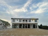 GİRNE/ÇATALKÖY'DE ANA CADDE ÜZERİ KİRALIK DÜKKANLAR VE DEPOLAR