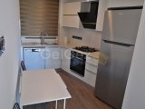 GİRNE/MERKEZDE HAVUZLU SİTEDE SATILIK 2+1 DAİRE
