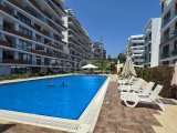 GİRNE/MERKEZDE HAVUZLU SİTEDE SATILIK 2+1 DAİRE
