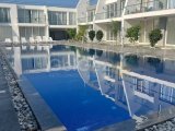GİRNE/DOĞANKÖY'DE HAVUZLU SİTEDE SATILIK 1+1 DAİRE