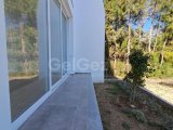 GİRNE/DOĞANKÖY'DE SATILIK 2+1 BAHÇELİ DAİRE