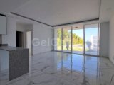 GİRNE/DOĞANKÖY'DE SATILIK 2+1 BAHÇELİ DAİRE