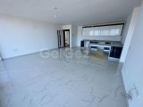 GİRNE/DOĞANKÖY'DE HAVUZLU SİTEDE SATILIK 2+1 DAİRE