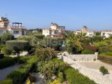 GİRNE / LAPTA'DA ORTAK HAVUZLU SATILIK 2+1 DAİRE