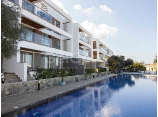 Girne Alsancak’ta, Gözde Sitede, Necat British Koleji’ne Yürüme Mesafesinde Satılık 2+1 Bahçeli Daire!
