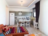 Ozanköy'de Otellere yakın 2+1 daire + Çim Bahçeye sahip aileler için huzurlu ve güvenli günlük kiralık daire