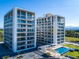 Gaziveren'de Sıfır Modern Türk Koçanlı 1+1 Daire + Deniz Manzaralı Balkonlu + Denize Yürüme Mesafesinde + Ortak Havuzlu + Site İçerisinde Birçok Olanaklar