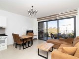 FİYAT £149,999'dan £99,900 DÜŞTÜ! Denize Sıfır 1+1 Full eşyalı Zemin Kat Daire