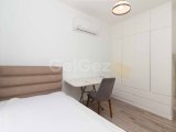Bellapais'te Havuzlu Site İçerisinde Çatı Teraslı ve Ful Eşyalı 4+1 İkiz Villa