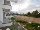 Çatalköy'de Satılık 2+1 Zemin Kat Dağ ve Deniz Manzaralı Lüks Türk Koçanlı Daire + Ödeme Planlı