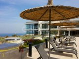 Zemin katta modern stüdyo + deniz manzarası + ortak havuz + plaja yürüme mesafesinde