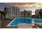 Güvenlikli sitede 2+1 Daireler + Ortak Yüzme Havuzlu + Yatırım Fırsatlı + Ödeme Planlı