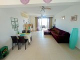 2 yatak odalı bahçeli ikinci el daire + full eşyalı + ortak havuzlar + kapılı güvenlik + Sahibi adına tapu, KDV ödenmiş