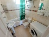 2 yatak odalı bahçeli ikinci el daire + full eşyalı + ortak havuzlar + kapılı güvenlik + Sahibi adına tapu, KDV ödenmiş