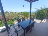 2 yatak odalı bahçeli ikinci el daire + full eşyalı + ortak havuzlar + kapılı güvenlik + Sahibi adına tapu, KDV ödenmiş