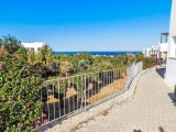 2 yatak odalı bahçeli ikinci el daire + full eşyalı + ortak havuzlar + kapılı güvenlik + Sahibi adına tapu, KDV ödenmiş